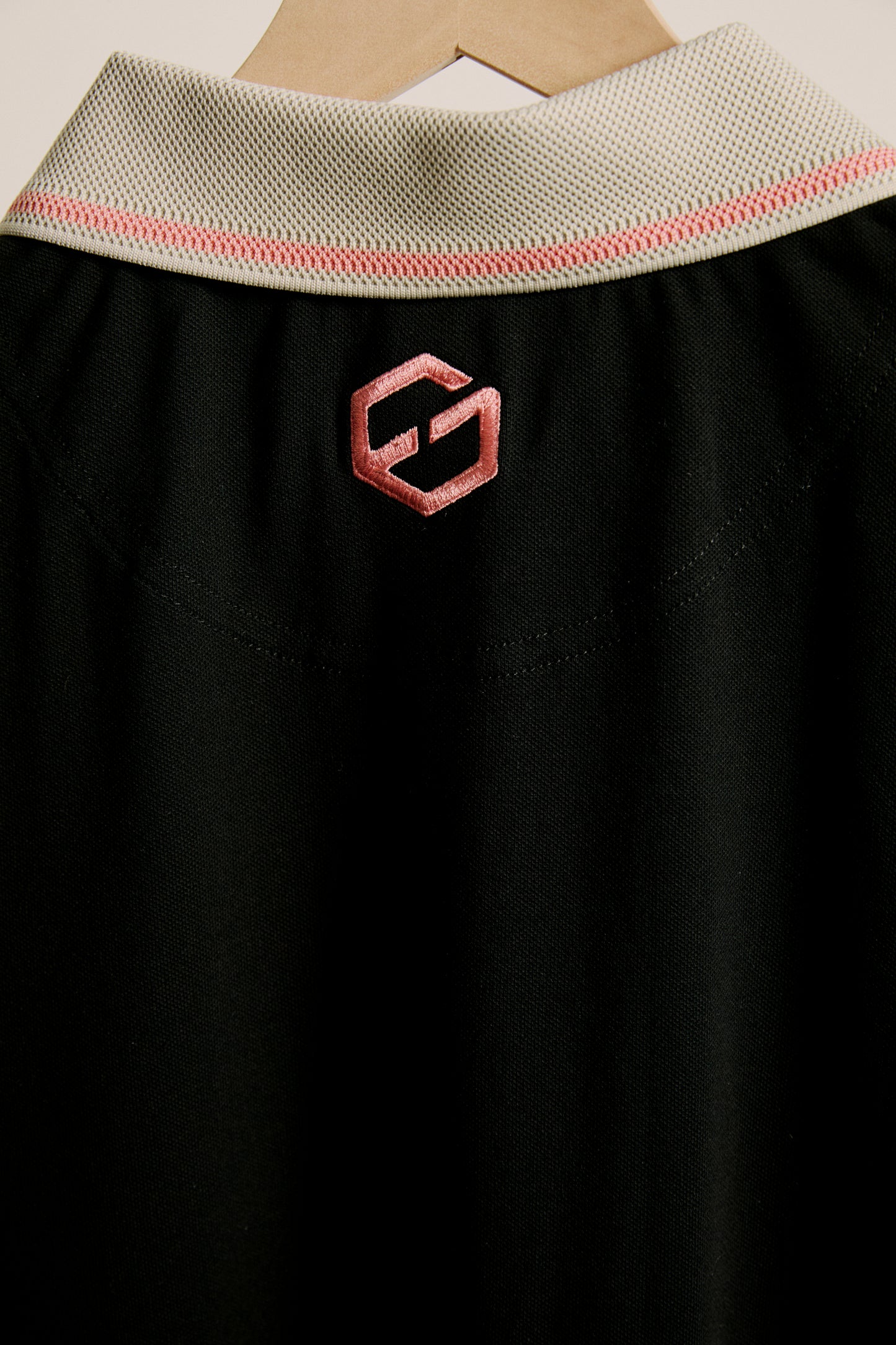 Emery Apex Polo Black & Pink