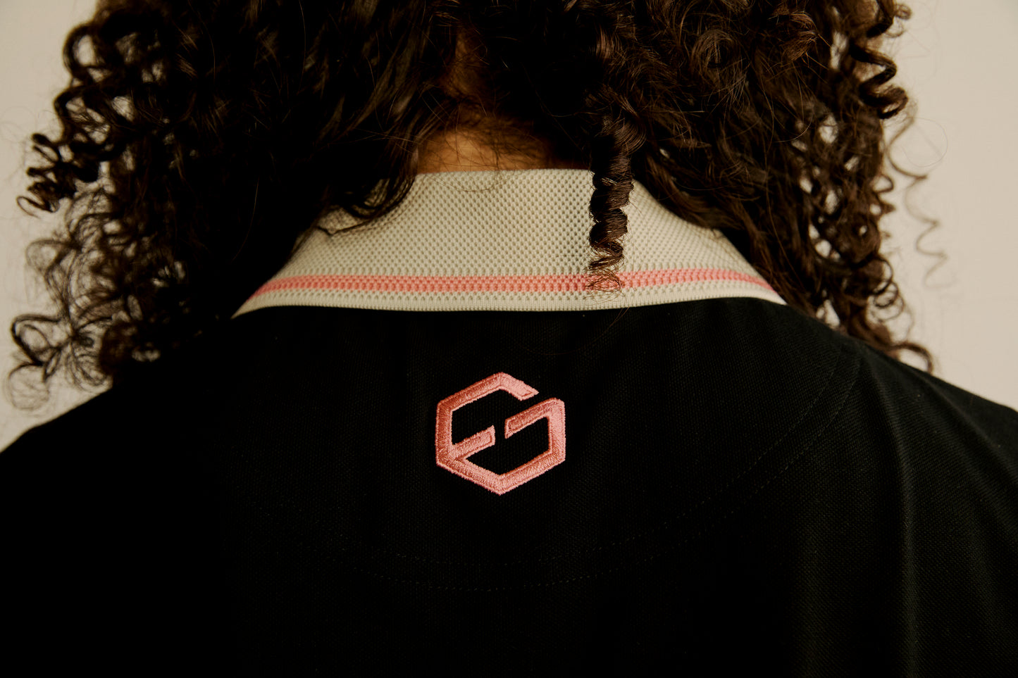 Emery Apex Polo Black & Pink